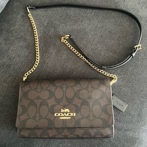 Coach flap clutch crossbody in signature canvas